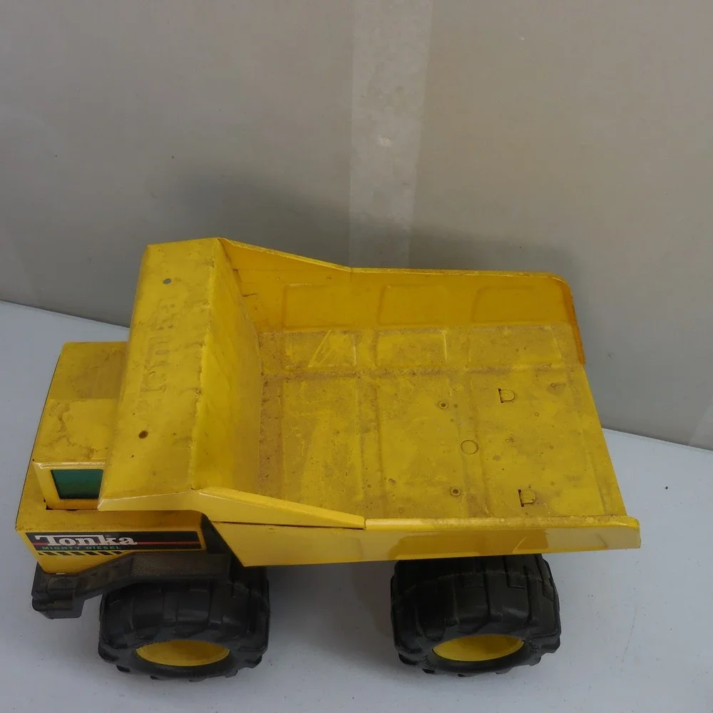 Vintage Tonka Mighty Diesel Dump Truck Yellow Pressed Steel Construction Toy